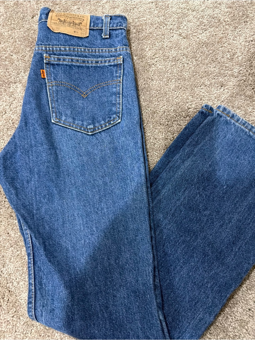 Vintage Levi's Women's Blue High-Waist Straight Leg Jeans
